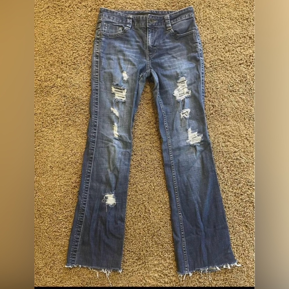 Size 6 women’s Calvin Klein ripped distressed blue jeans boot cut